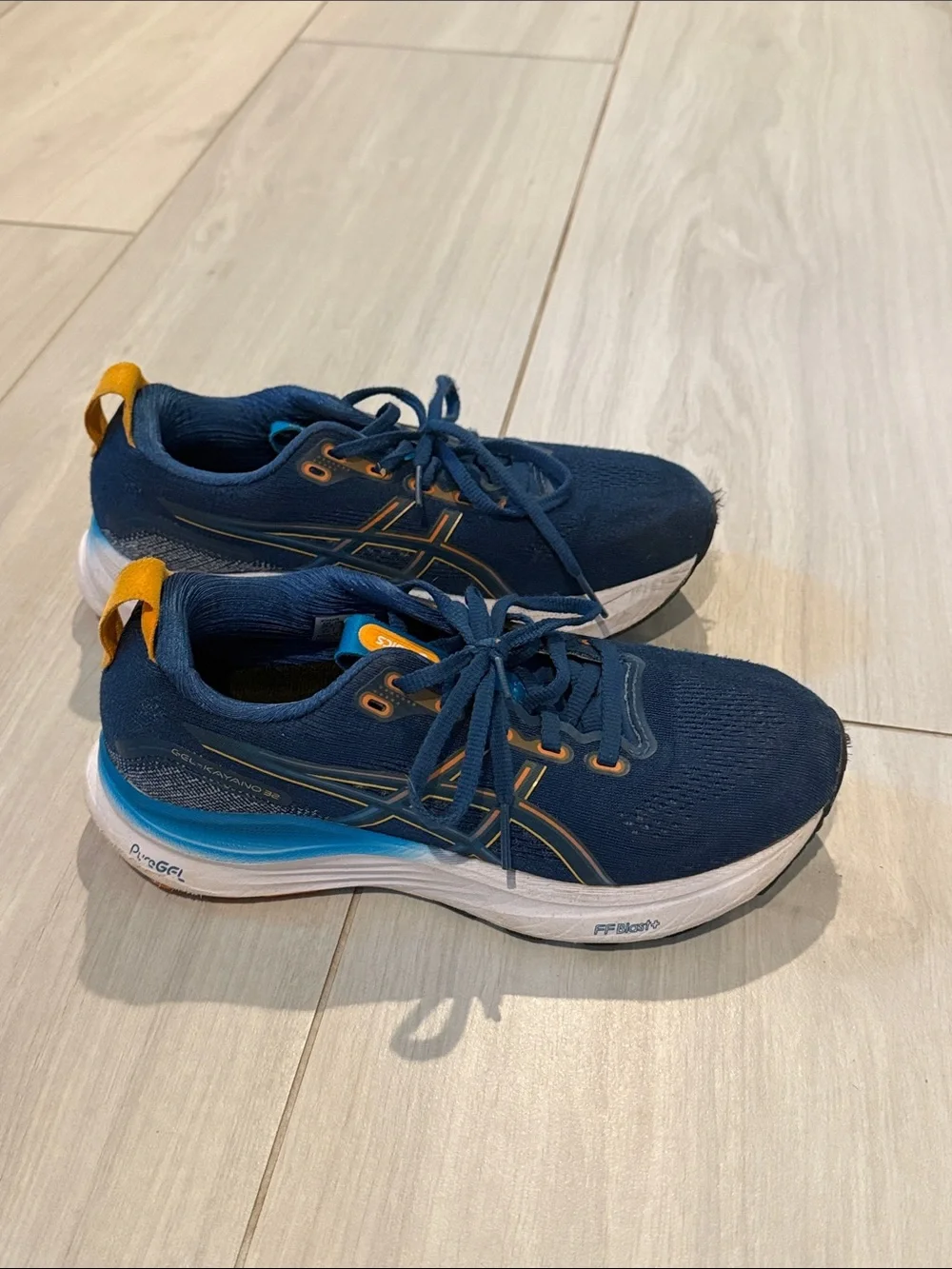 Kids ASICS Navy Blue Gel Athletic Sneakers with Orange Accent, size 4.5 big kid